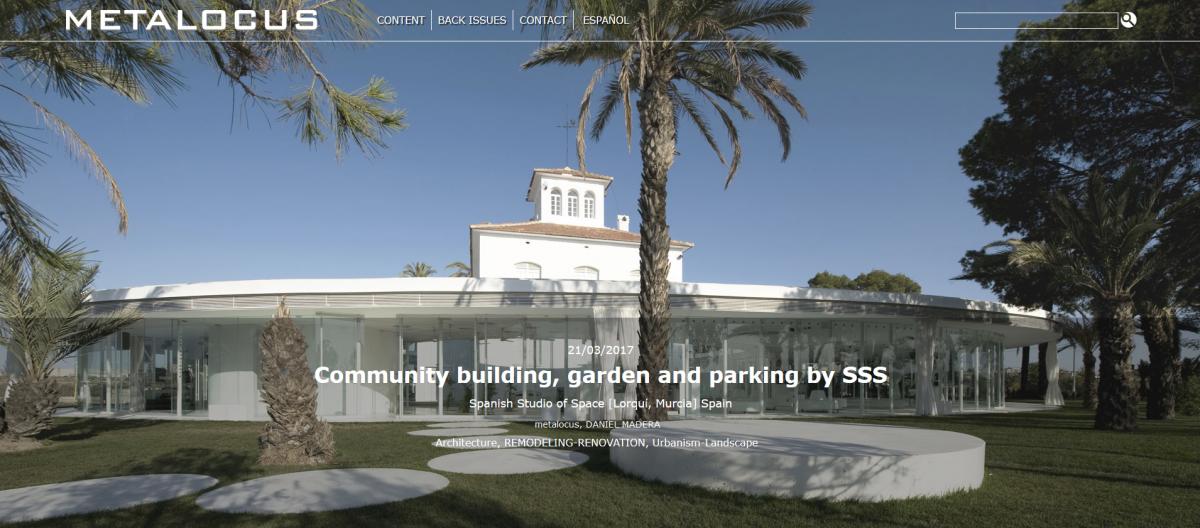 Metalocus: Community building and parking and garden.